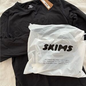 SKIMS maternity long sleeve thong bodysuit